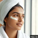 피부관리사의 실습에서 배운 사례 - A serene and fresh-faced young Indian woman with clear, glowing skin performing a gentle deep cleans...